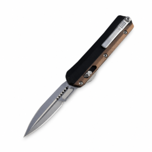 4 inch brown switchblade on white background